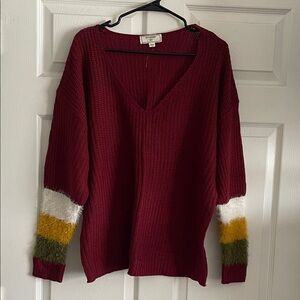 Elegant V-Neck Sweater in Burgundy with Colorful Sleeves